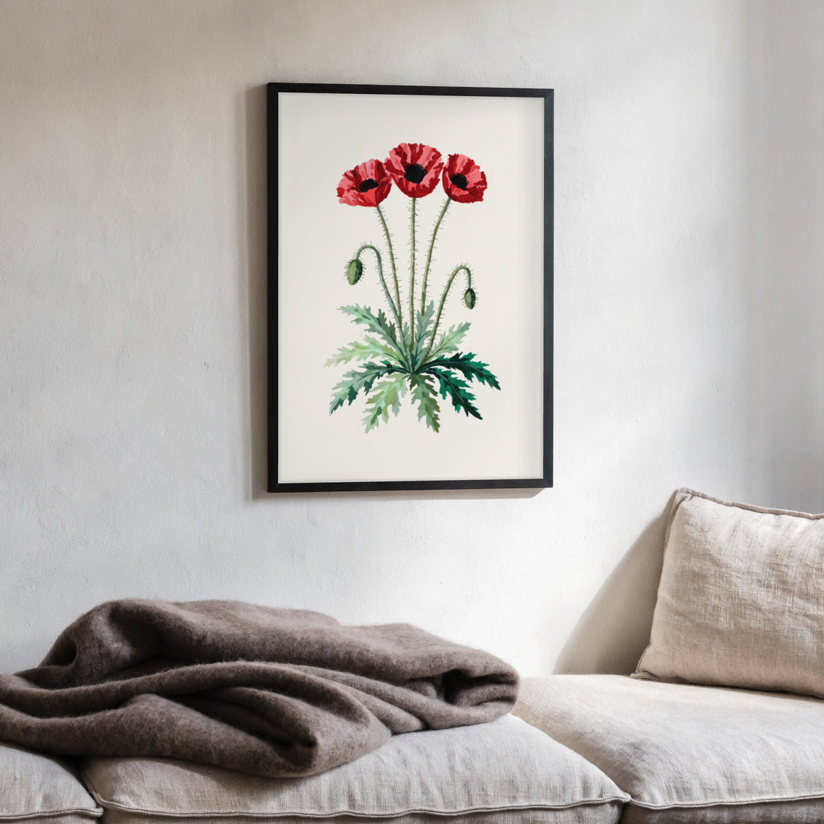 Plakat Mak polny w czarnej ramie na ścianie – aranżacja we wnętrzu